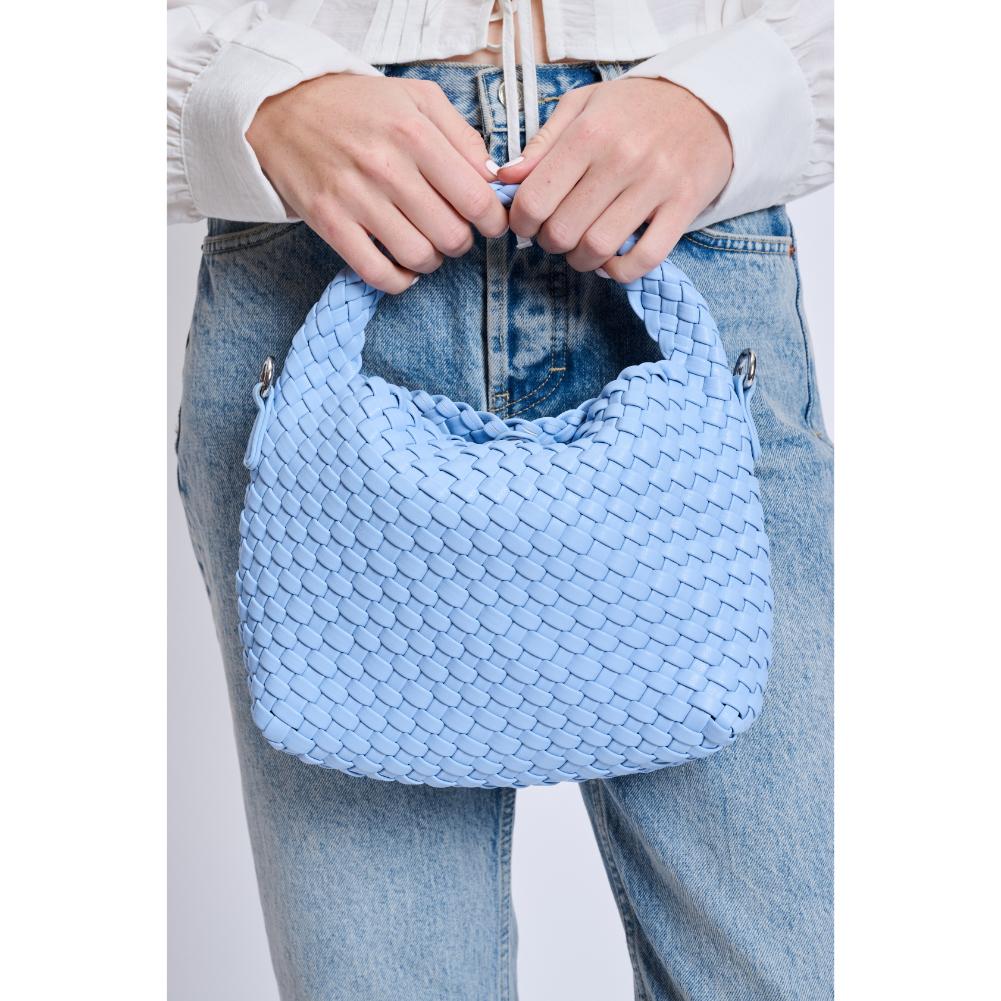 Woman wearing Sky Blue Moda Luxe Jessamine Crossbody 842017132950 View 4 | Sky Blue