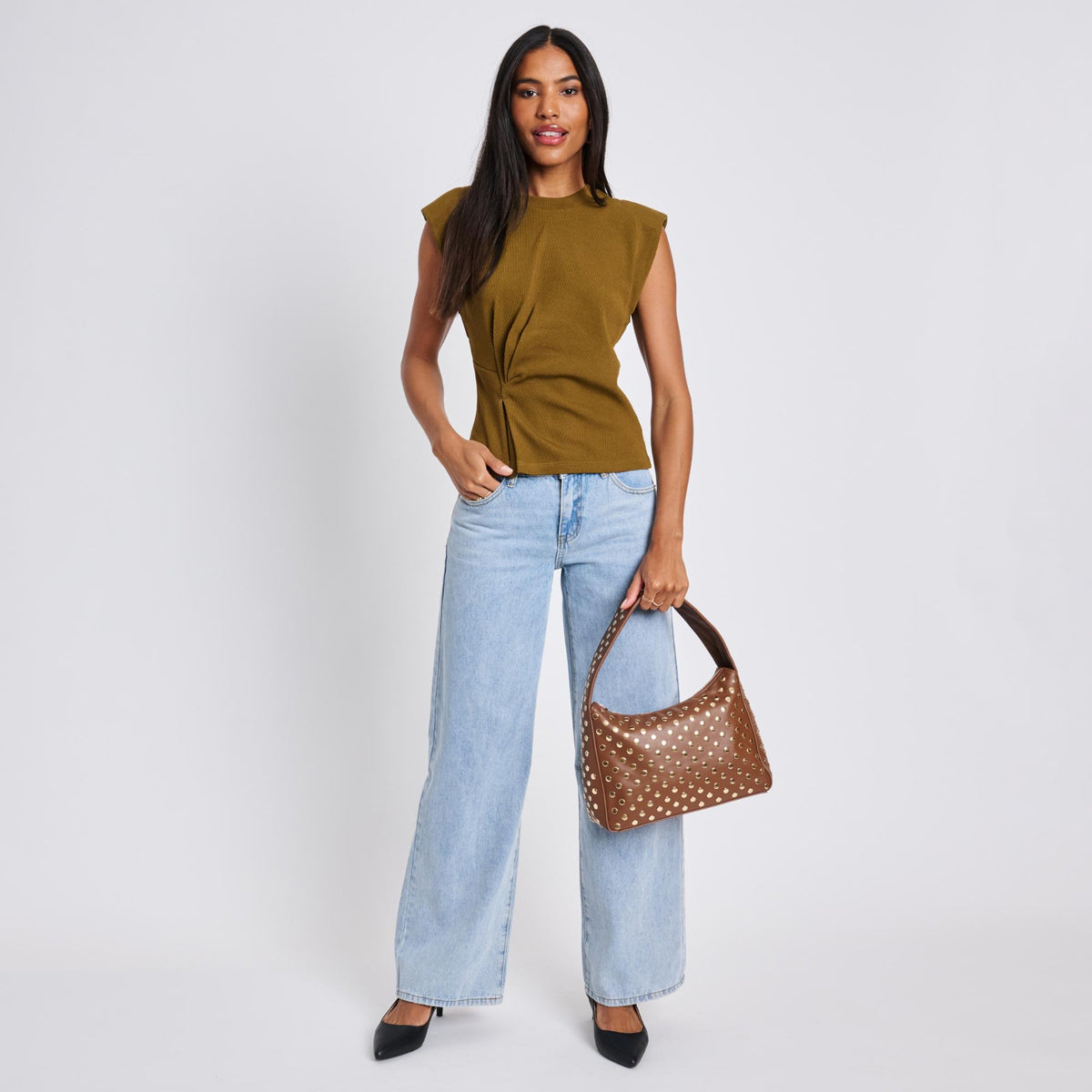 Woman wearing Chocolate Moda Luxe Rebel Crossbody 842017136477 View 4 | Chocolate