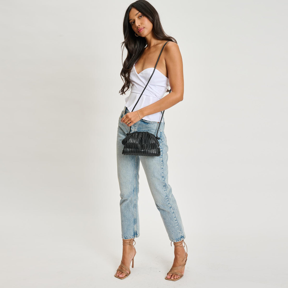 Woman wearing Black Sol and Selene Divaire Crossbody 842017135517 View 3 | Black