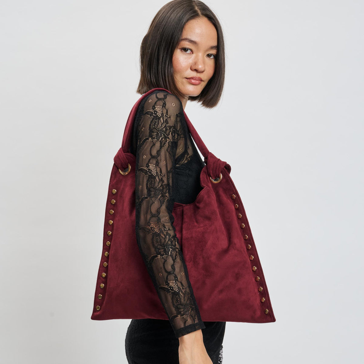 Woman wearing Wine Sol and Selene Meadow Hobo 842017139966 View 1 | Wine