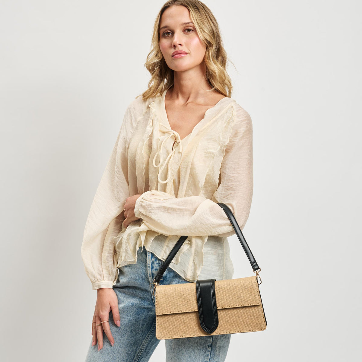 Woman wearing Natural Black Moda Luxe Violet - Straw Crossbody 842017142126 View 2 | Natural Black