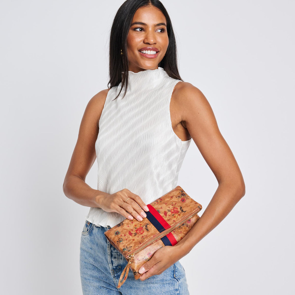 Woman wearing Tan Sol and Selene Jules Print Clutch 842017119418 View 2 | Tan