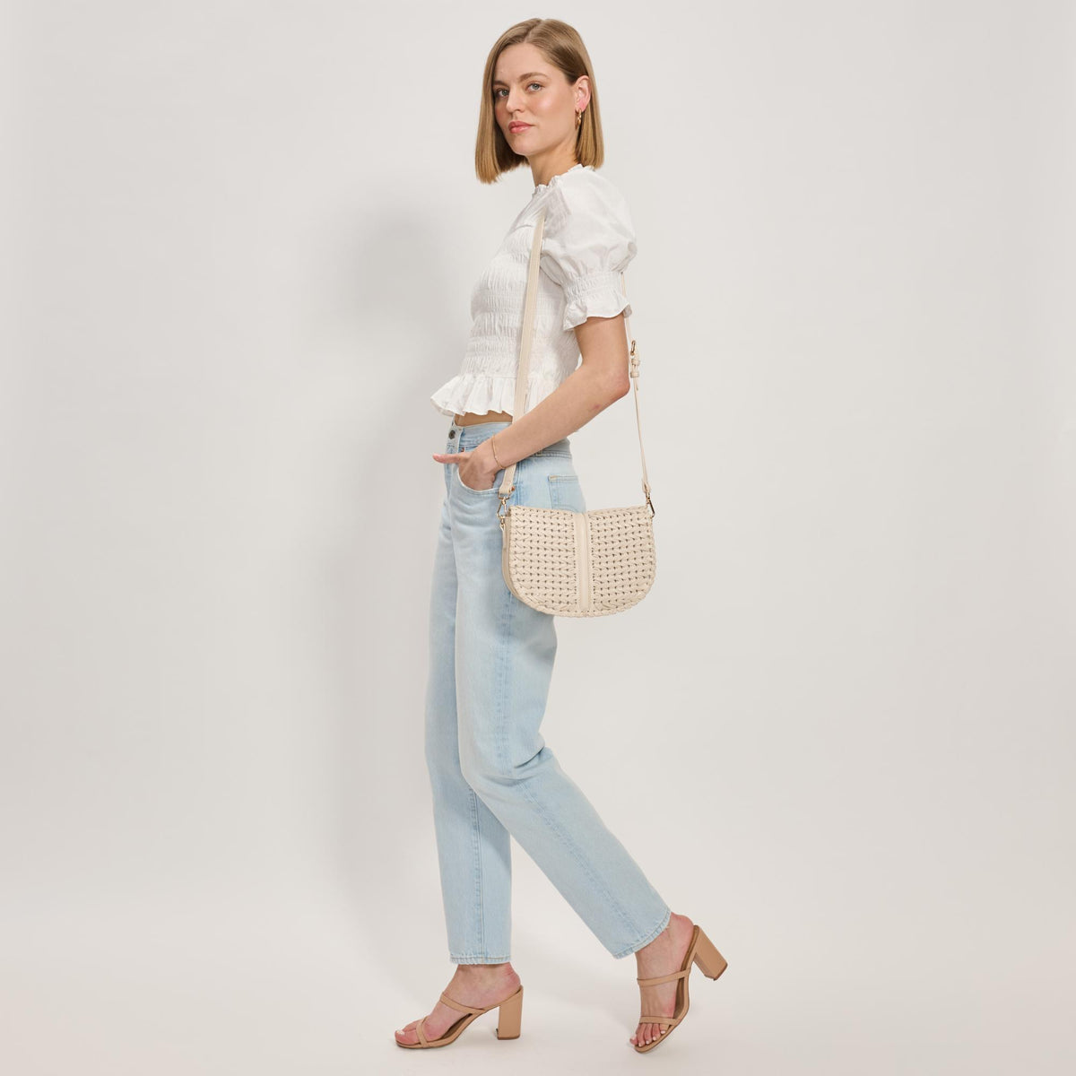 Woman wearing Oatmilk Moda Luxe Cecillia Crossbody 842017137696 View 3 | Oatmilk