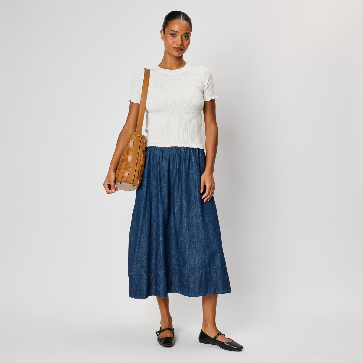 Woman wearing Tan Moda Luxe Naomi Bucket 842017142645 View 4 | Tan