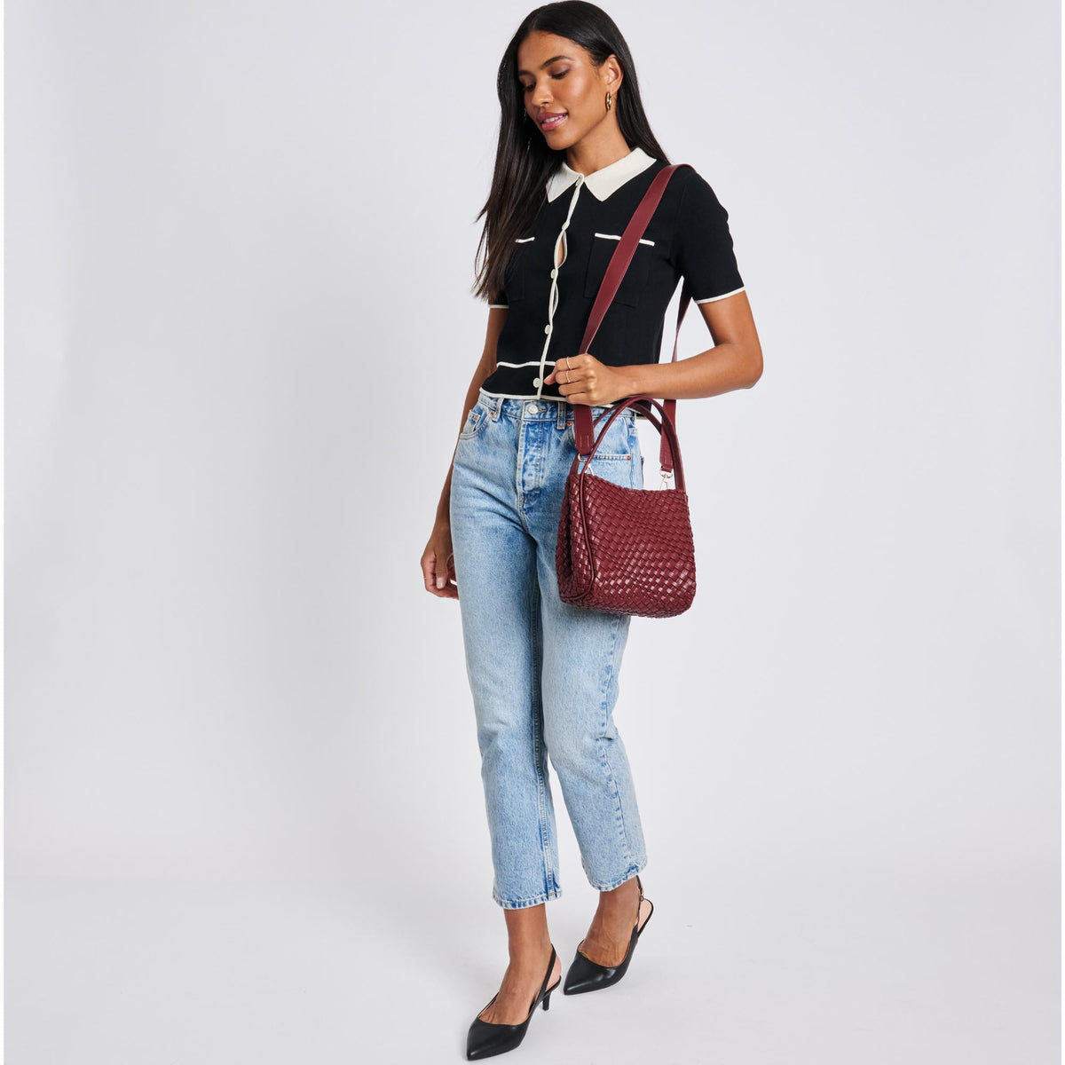 Woman wearing Burgundy Moda Luxe Roxy Crossbody 842017136279 View 2 | Burgundy