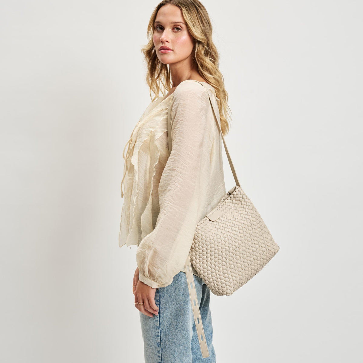 Woman wearing Ivory Sol and Selene Isadora Bucket 842017137337 View 2 | Ivory