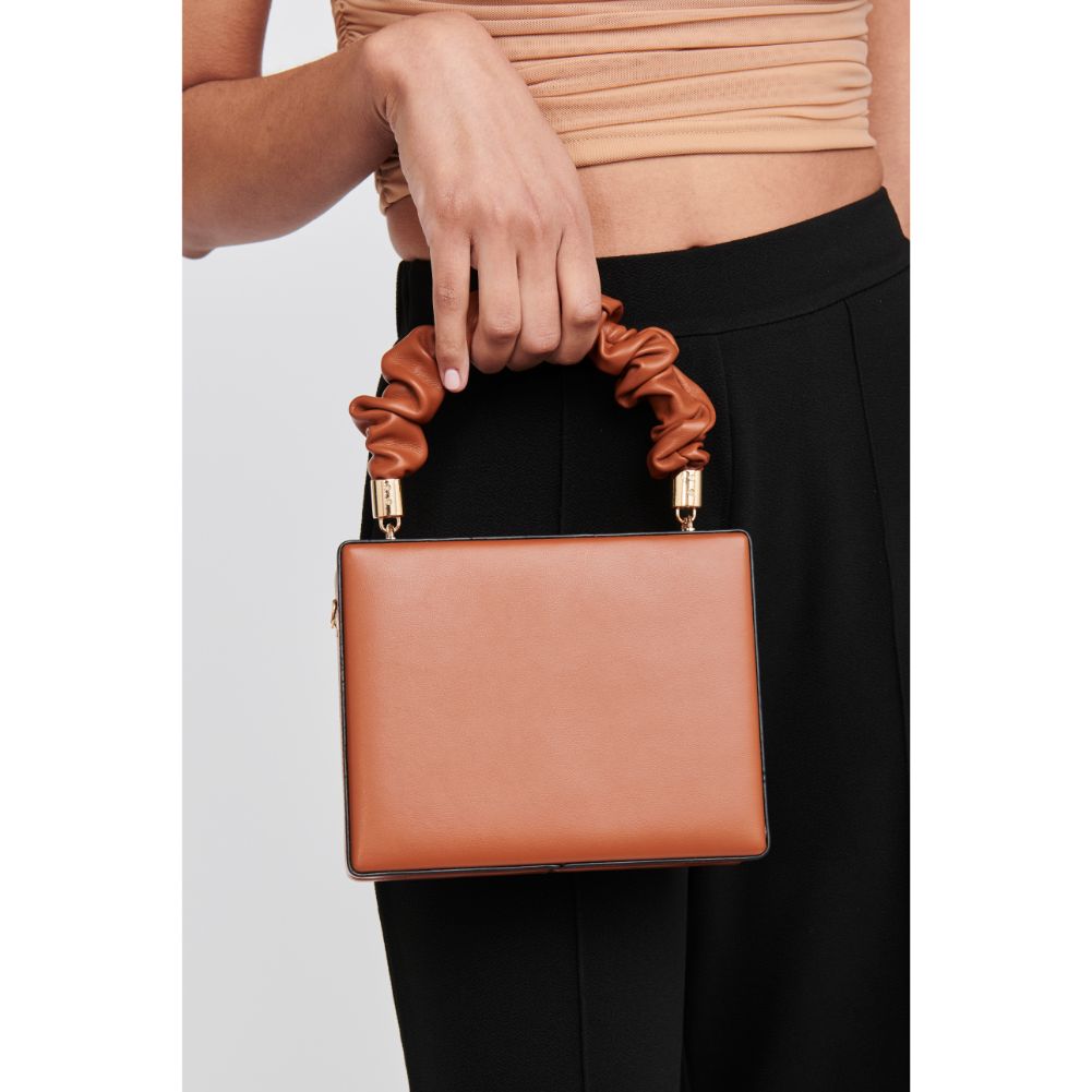 Woman wearing Tan Moda Luxe Kaia Crossbody 842017126140 View 2 | Tan