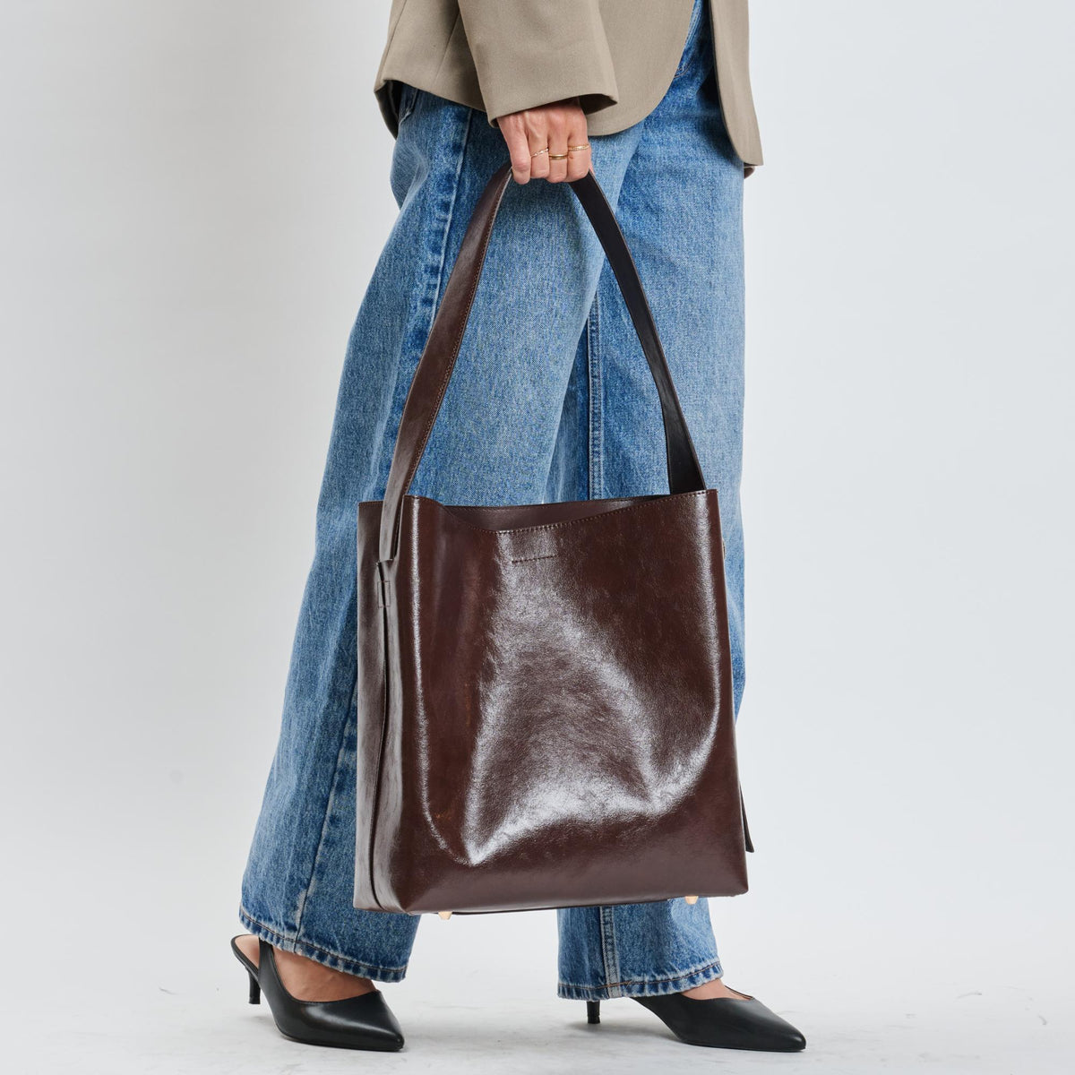 Woman wearing Chocolate Sol and Selene Brooke Bucket 842017139546 View 1 | Chocolate
