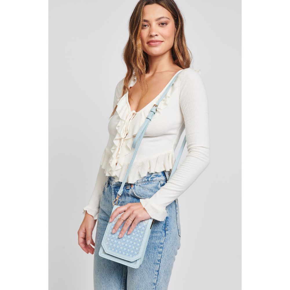 Woman wearing Eggshell Blue Moda Luxe Remi Crossbody 842017124177 View 1 | Eggshell Blue