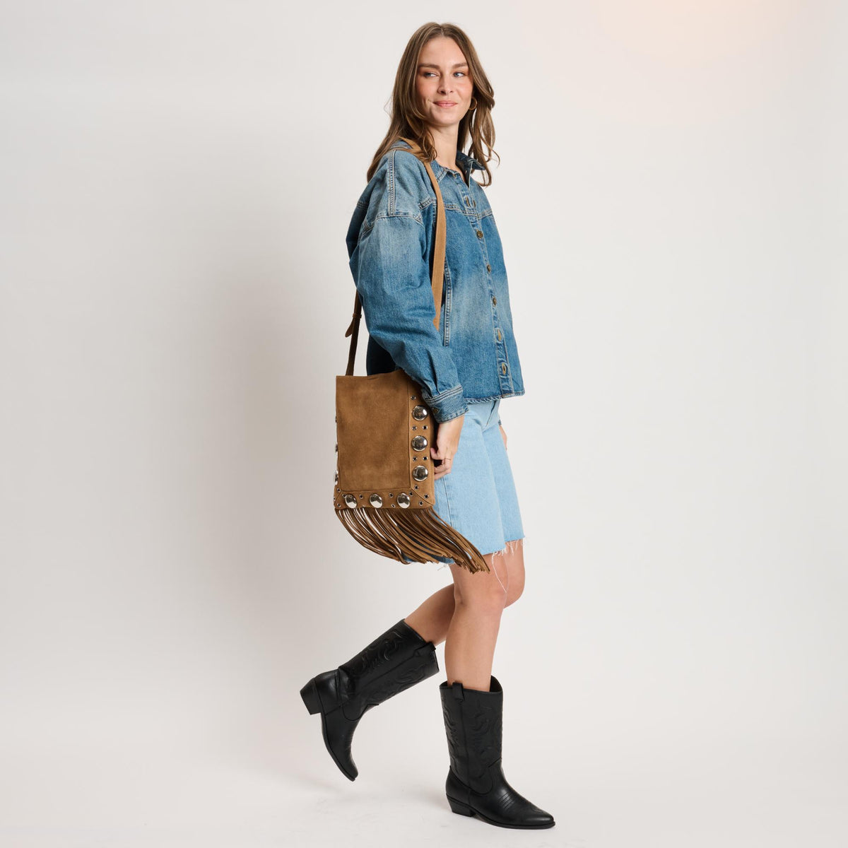 Woman wearing Cognac Moda Luxe Courtney Crossbody 842017140559 View 3 | Cognac