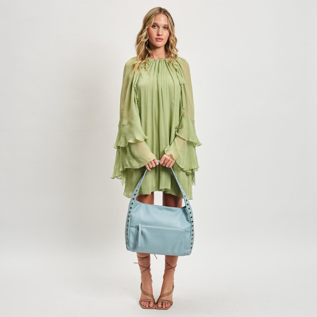 Woman wearing Ice Blue Sol and Selene Misty Hobo 842017137207 View 4 | Ice Blue
