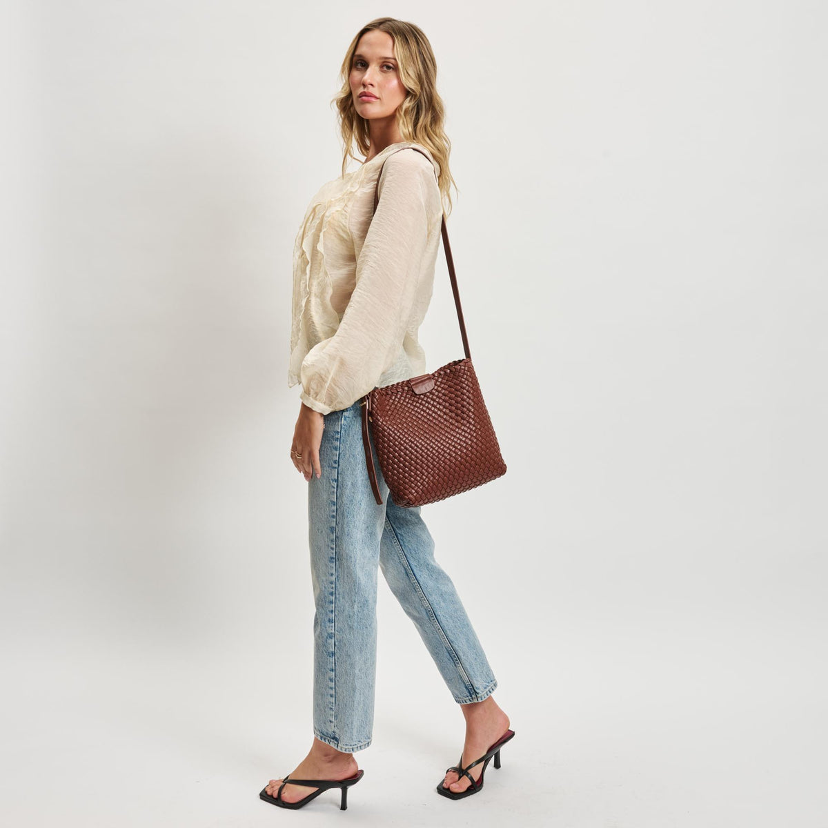 Woman wearing Chocolate Sol and Selene Isadora Bucket 842017137351 View 3 | Chocolate
