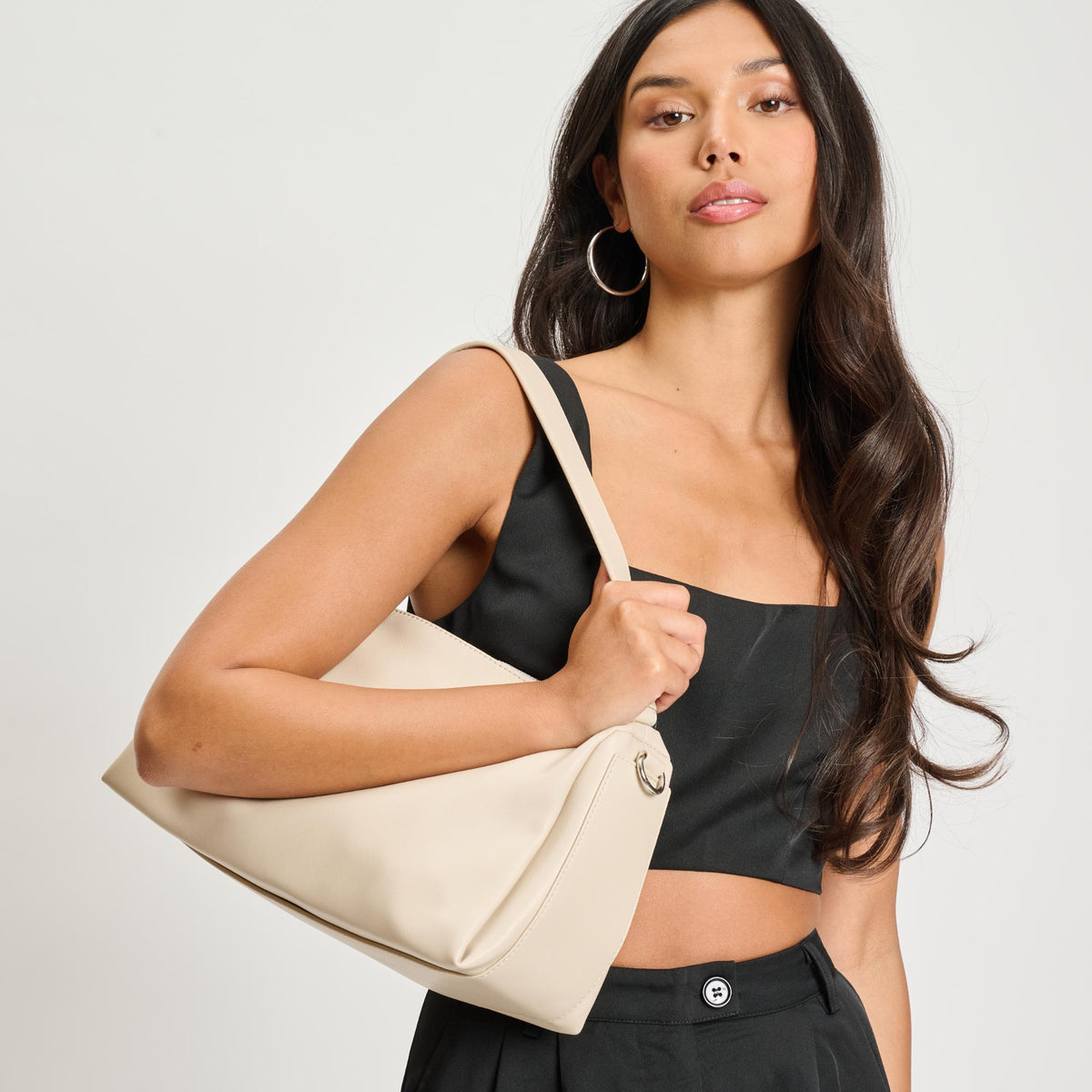 Woman wearing Ivory Sol and Selene Trendora Crossbody 842017134602 View 1 | Ivory