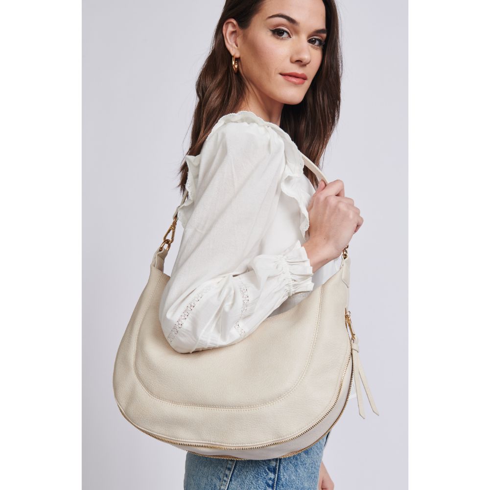 Woman wearing Ivory Sol and Selene Ruby Hobo 842017129387 View 2 | Ivory