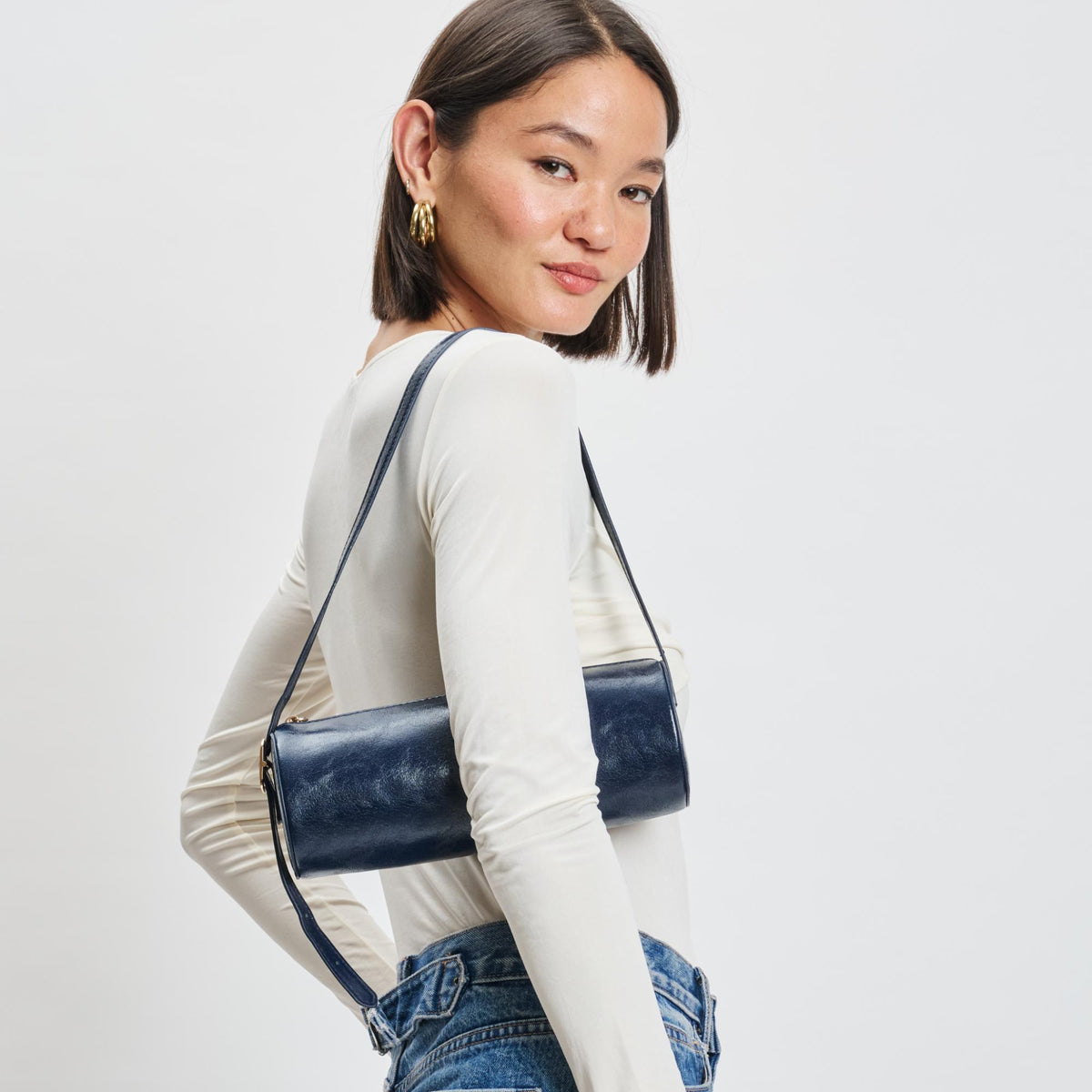 Woman wearing Midnight Sol and Selene Mila Shoulder Bag 842017139300 View 1 | Midnight