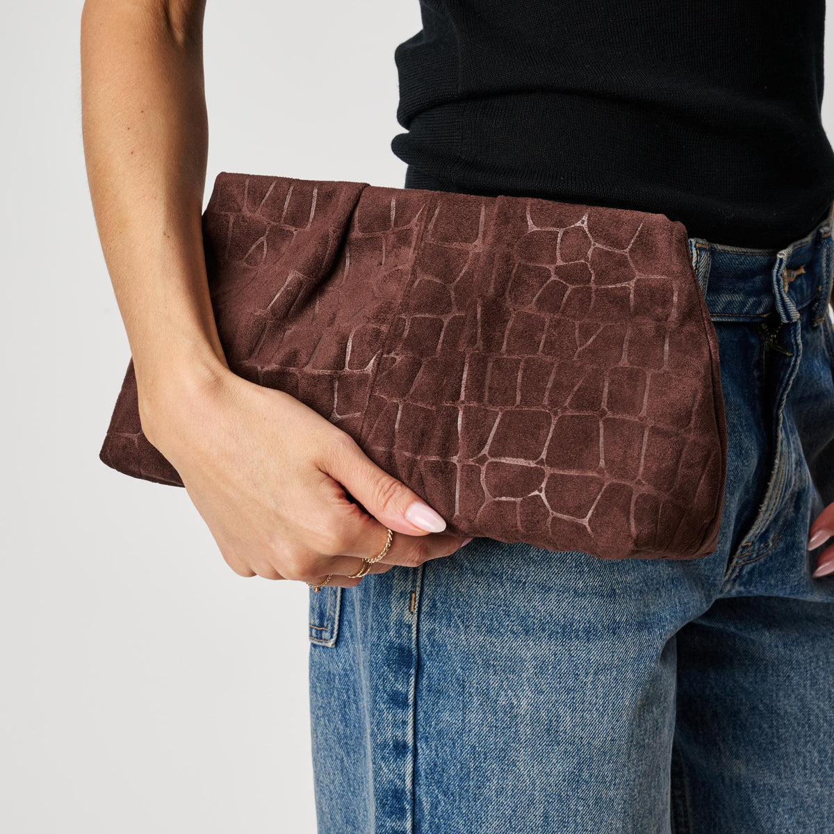 Woman wearing Chocolate Moda Luxe Elva Croco Clutch 842017142270 View 1 | Chocolate