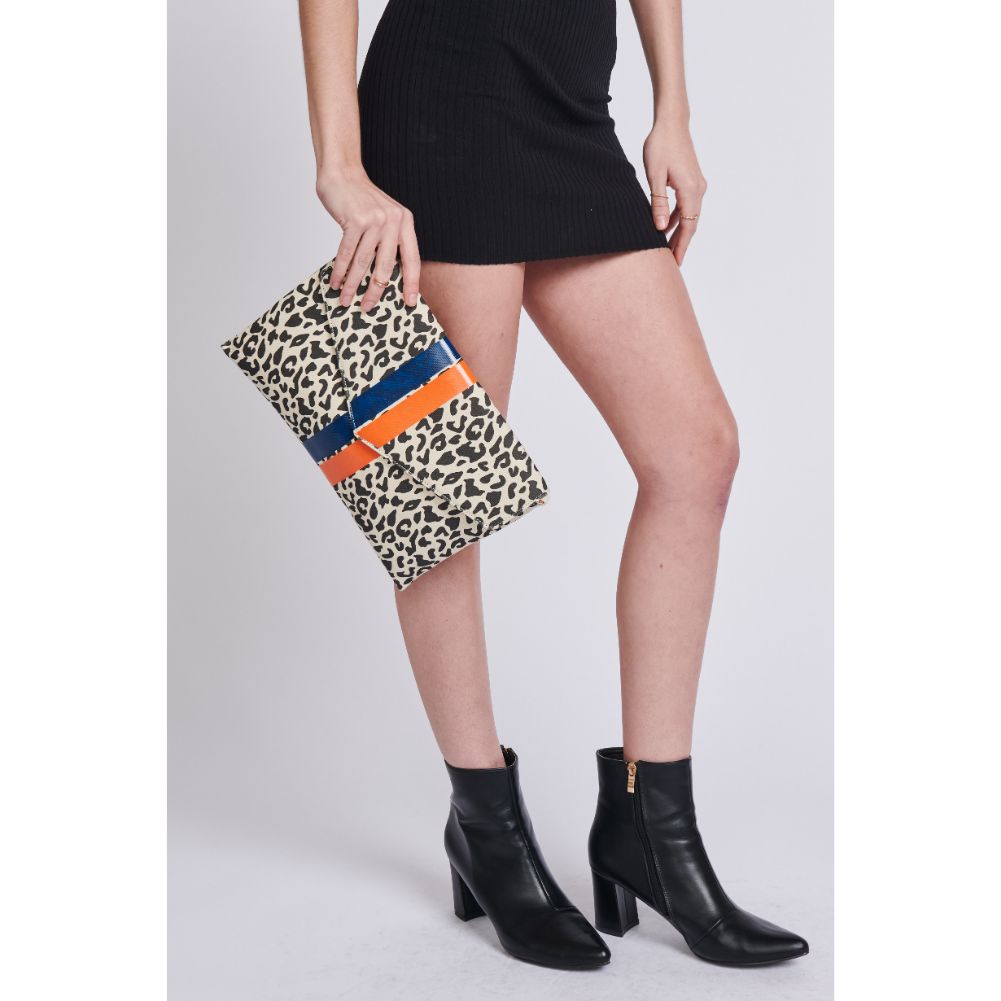 Woman wearing Black White Leopard Moda Luxe Tory Clutch 842017129240 View 2 | Black White Leopard