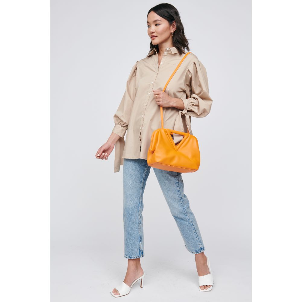 Woman wearing Orange Moda Luxe Kendra Crossbody 842017129981 View 2 | Orange