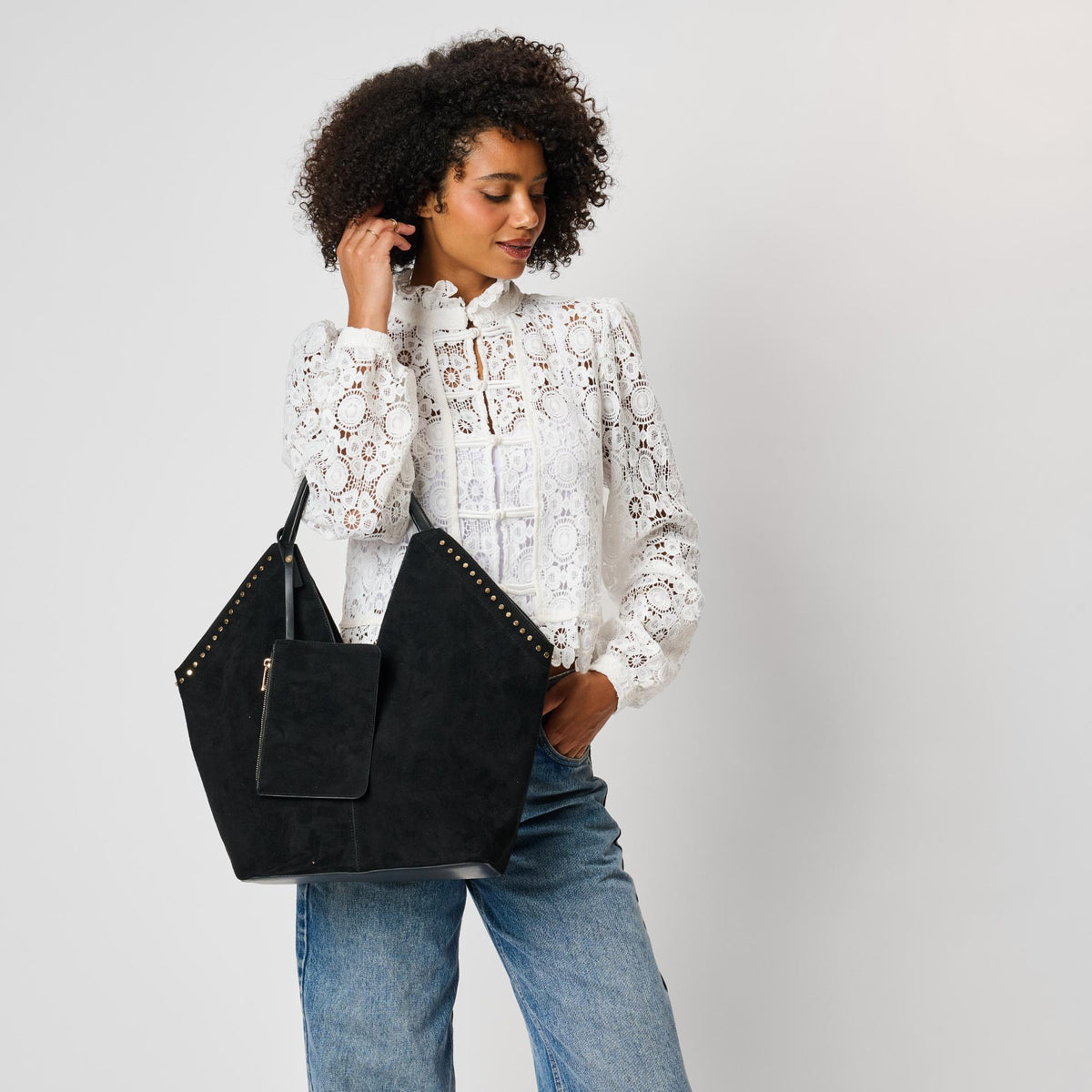 Woman wearing Black Moda Luxe Miranda Tote 842017142959 View 1 | Black