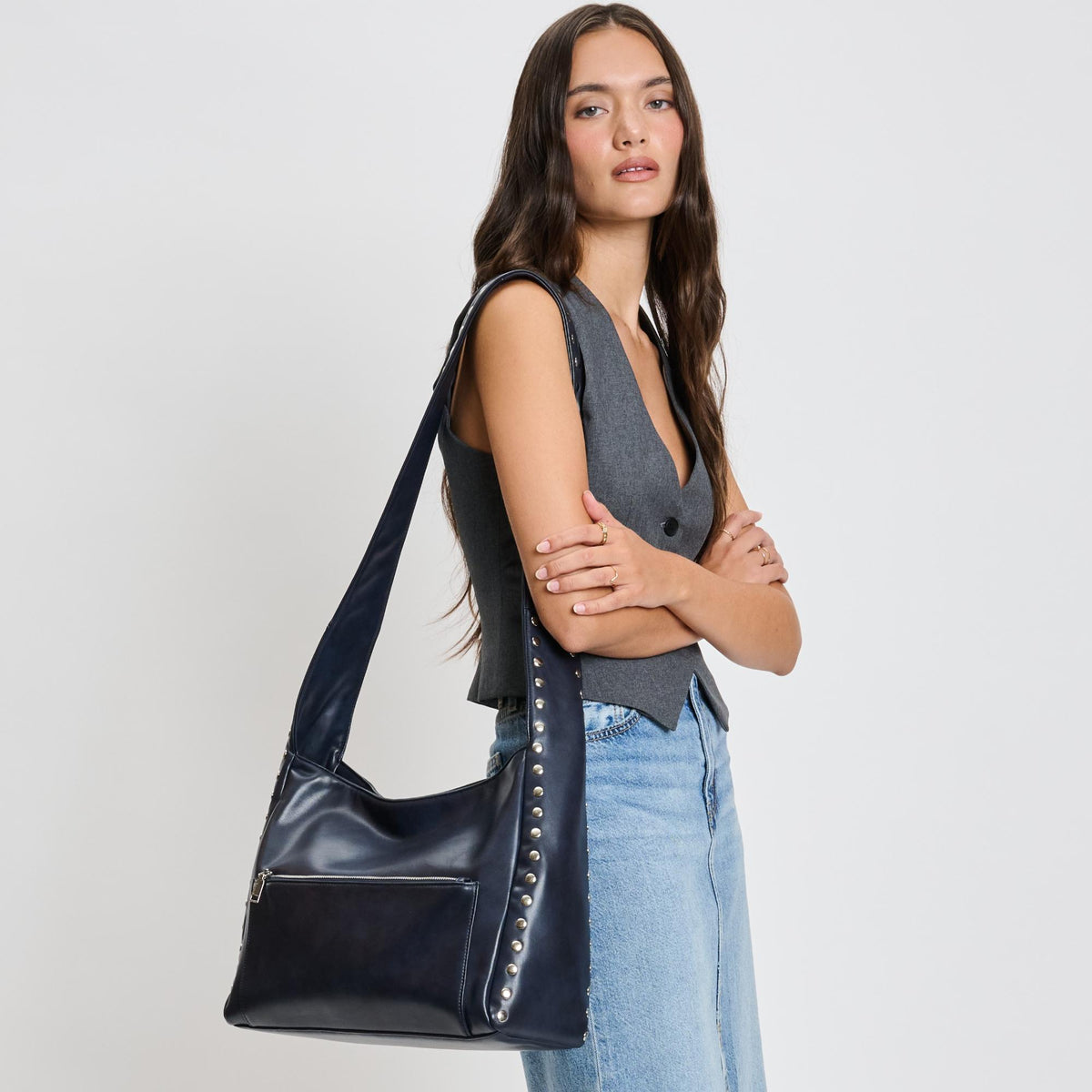 Woman wearing Navy Moda Luxe Electra Crossbody 842017136163 View 1 | Navy