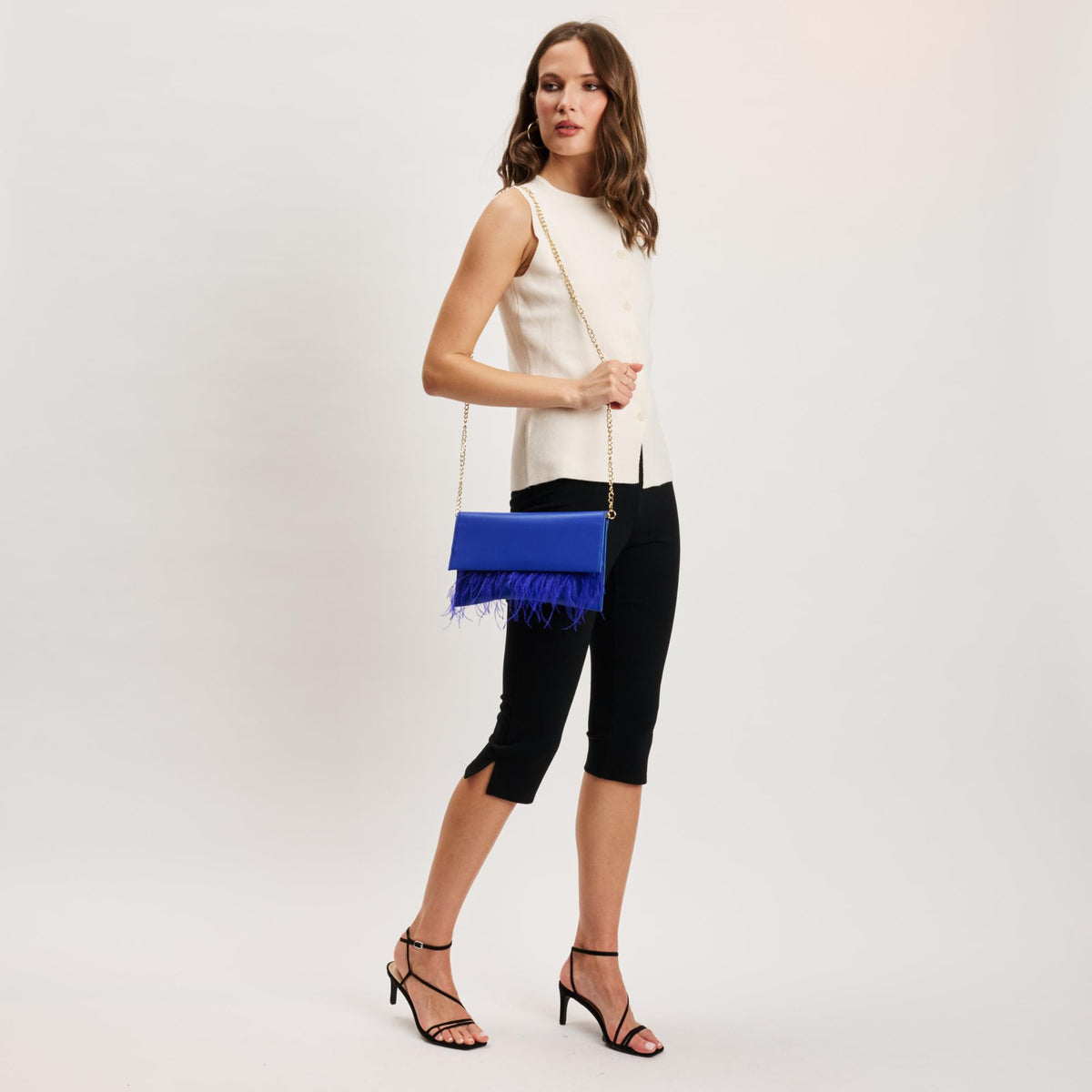 Woman wearing Electric Blue Moda Luxe Everlee Clutch 842017131144 View 3 | Electric Blue