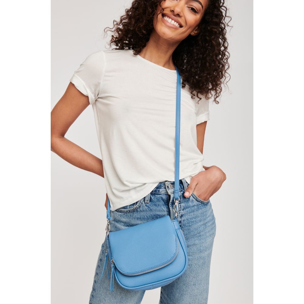 Woman wearing Blue Moda Luxe Diva Crossbody 842017127505 View 1 | Blue