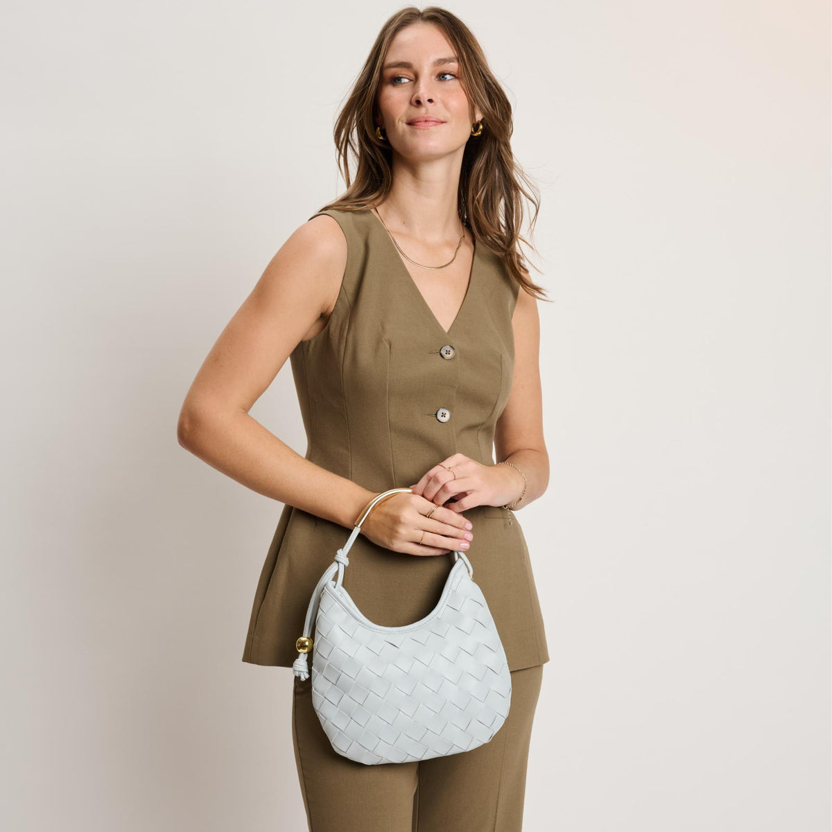 Woman wearing Ice Blue Moda Luxe Lucia Hobo 842017141259 View 1 | Ice Blue