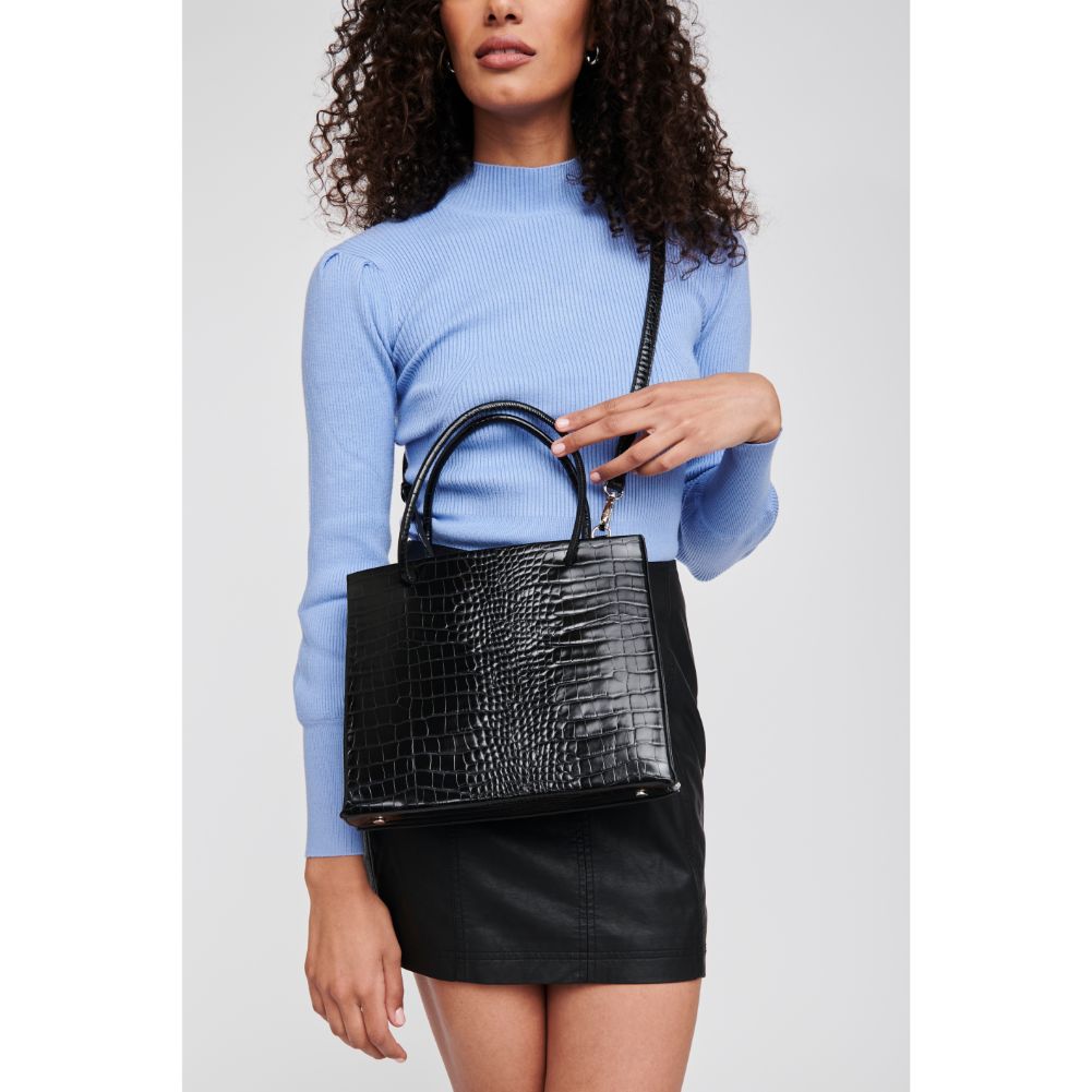 Woman wearing Black Moda Luxe Pierce Mini Tote 842017125051 View 1 | Black