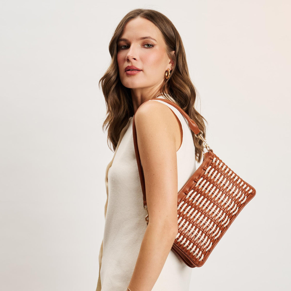 Woman wearing Tan Ivory Moda Luxe Maggie Crossbody 842017141280 View 1 | Tan Ivory