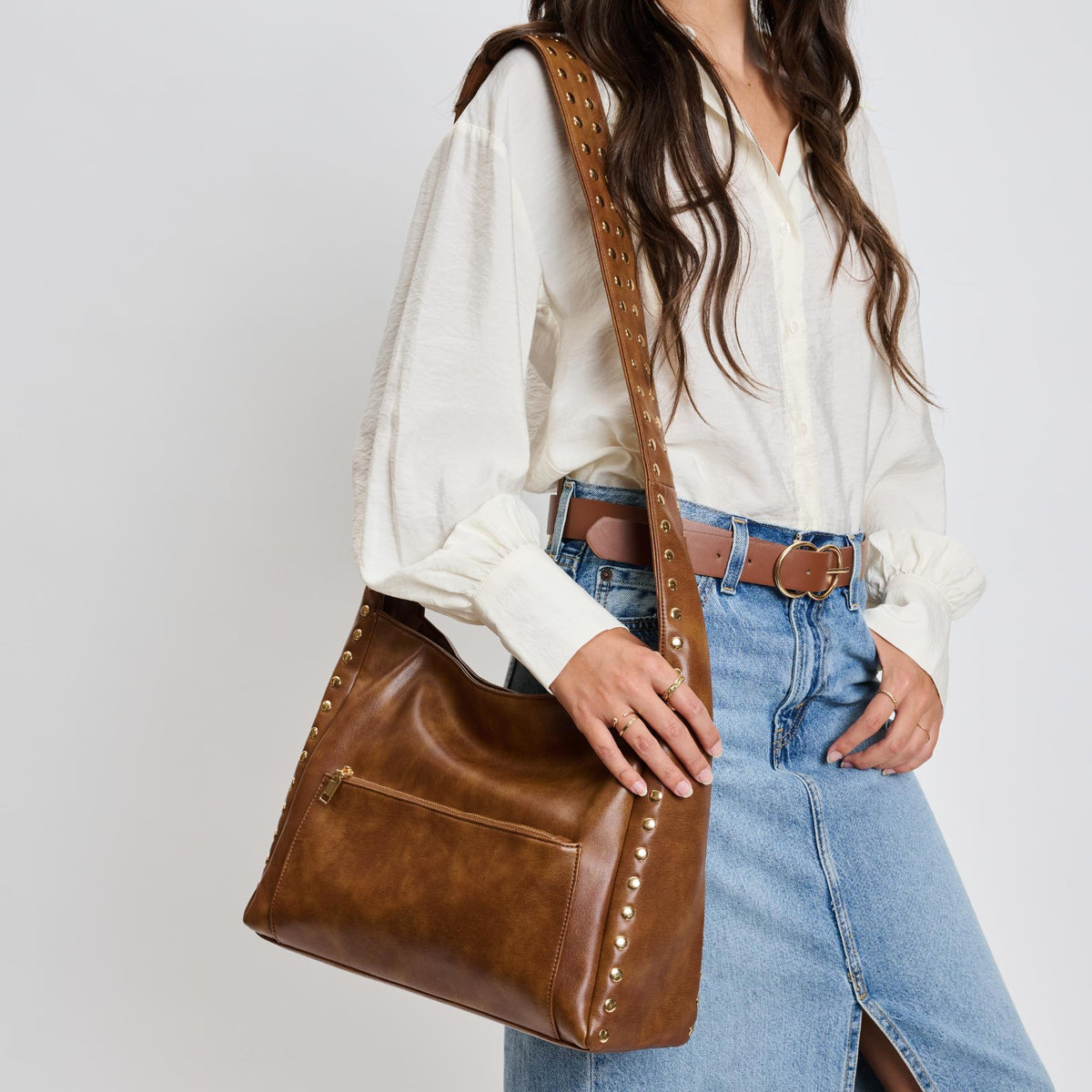 Woman wearing Chocolate Moda Luxe Electra Crossbody 842017136187 View 1 | Chocolate