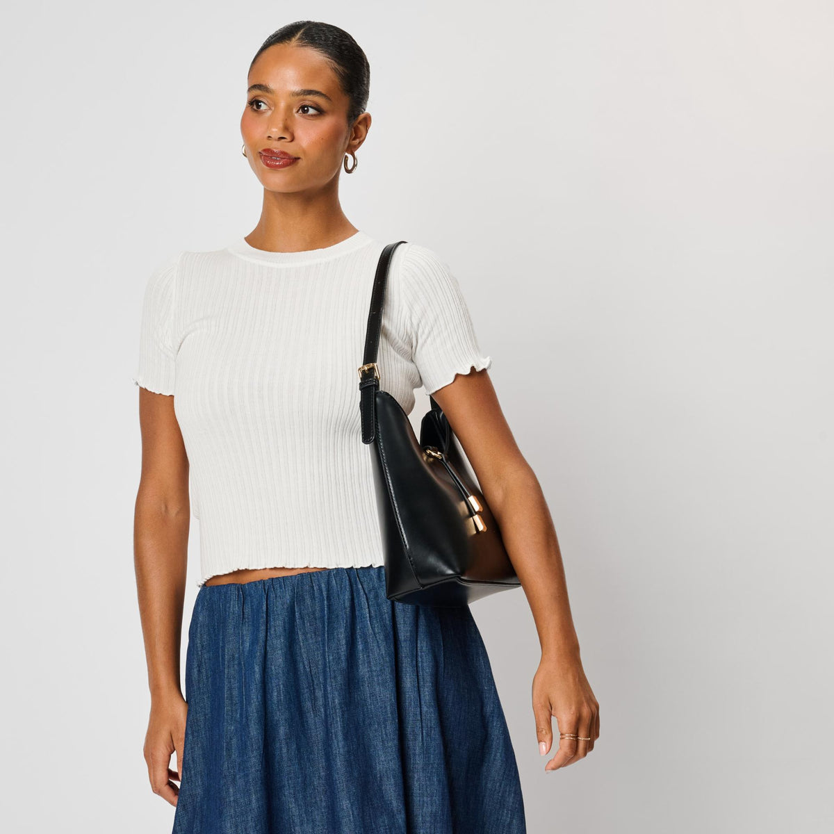 Woman wearing Black Moda Luxe Blair Shoulder Bag 842017143215 View 3 | Black