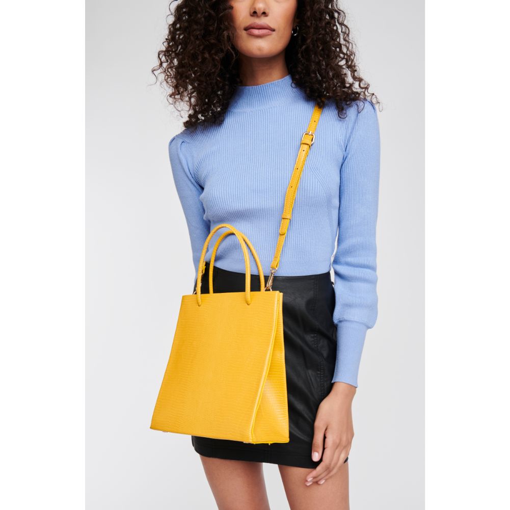 Woman wearing Sunflower Moda Luxe Piper Tote 842017125112 View 1 | Sunflower