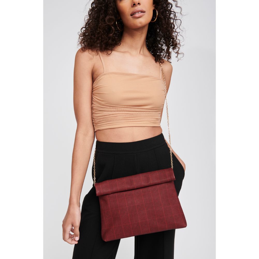 Woman wearing Red Moda Luxe Heather Clutch 842017116653 View 1 | Red