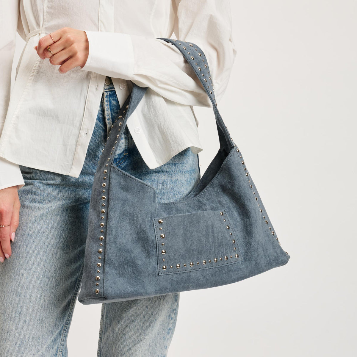 Woman wearing Denim Moda Luxe Dahlia Hobo 842017140658 View 2 | Denim