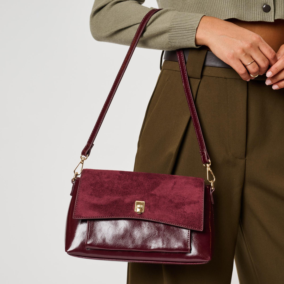 Woman wearing Burgundy Moda Luxe Aly Crossbody 842017143079 View 1 | Burgundy