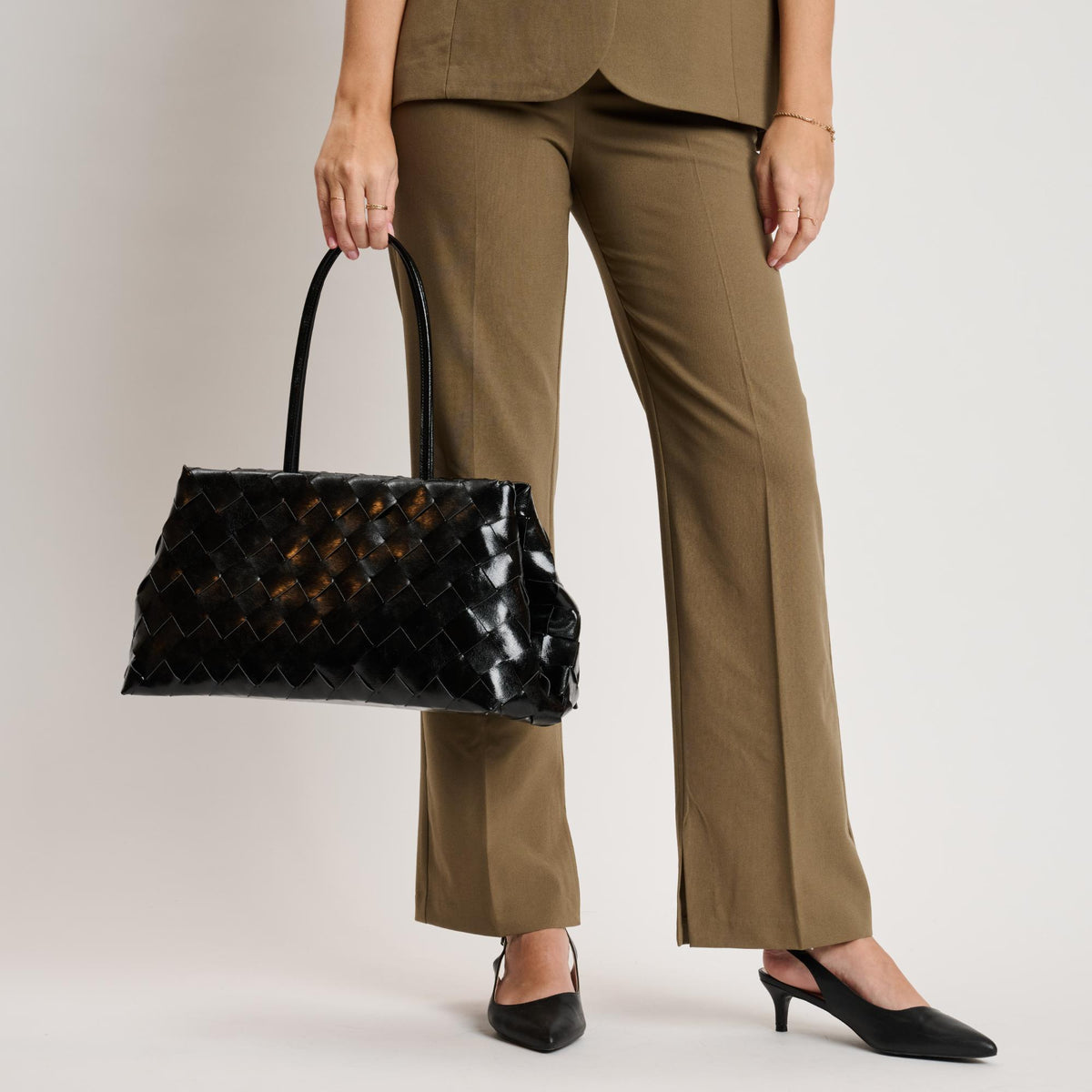 Woman wearing Black Moda Luxe Elsy Satchel 842017140931 View 1 | Black