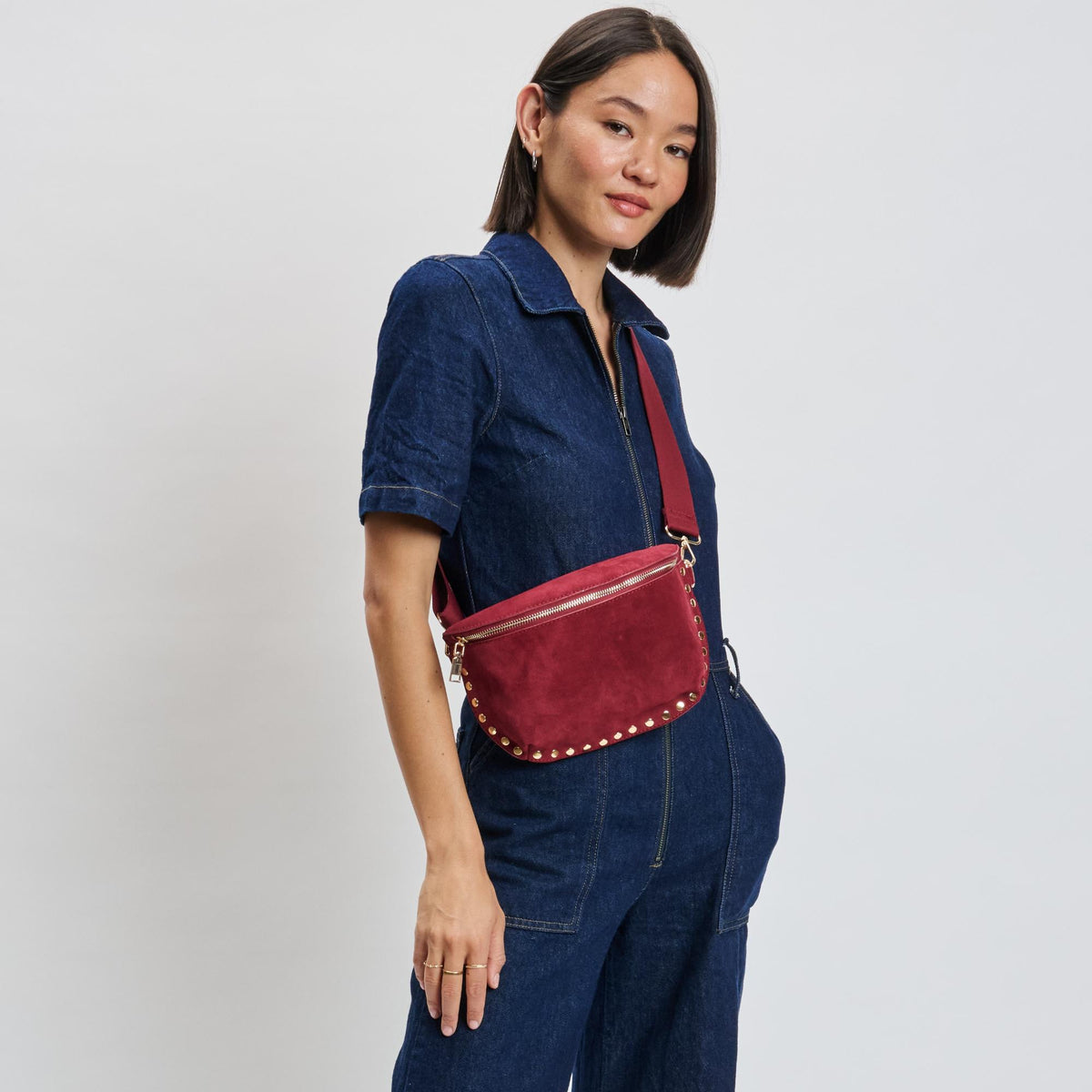 Woman wearing Wine Moda Luxe Gizelle-Suede Belt Bag 842017139683 View 1 | Wine
