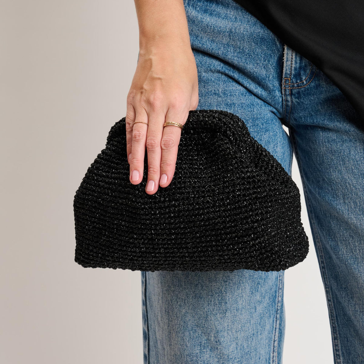 Woman wearing Black Moda Luxe Amelia Clutch 842017140979 View 1 | Black