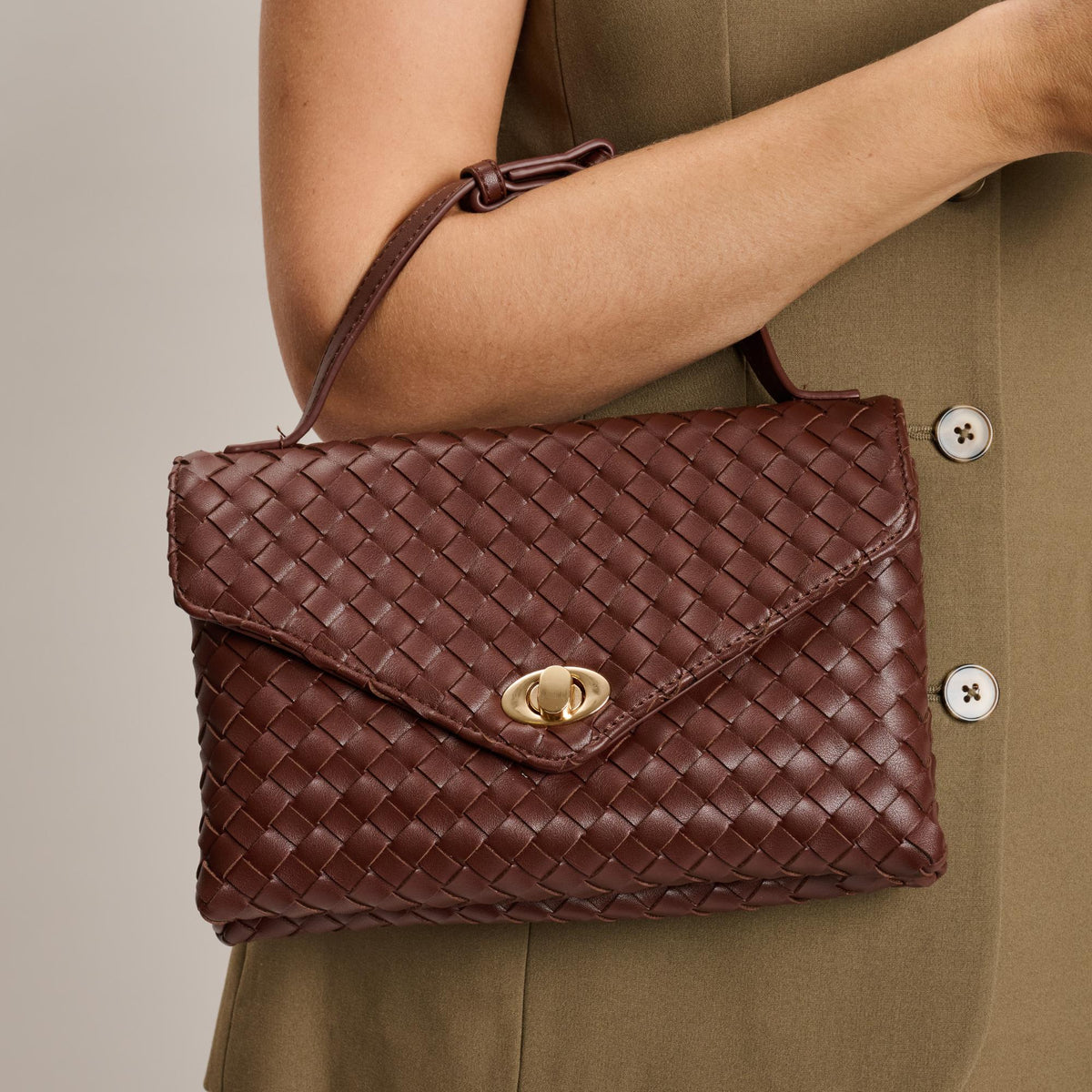 Woman wearing Chocolate Moda Luxe Harper Crossbody 842017139324 View 1 | Chocolate