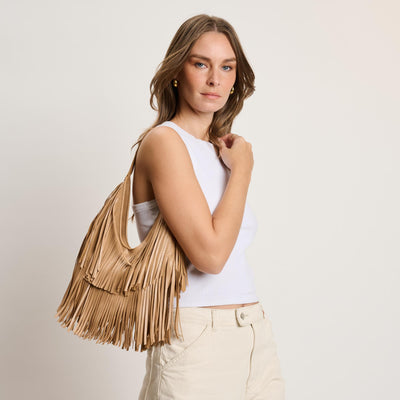 Woman wearing Natural Moda Luxe Stevie Hobo 842017141136 View 1 | Natural