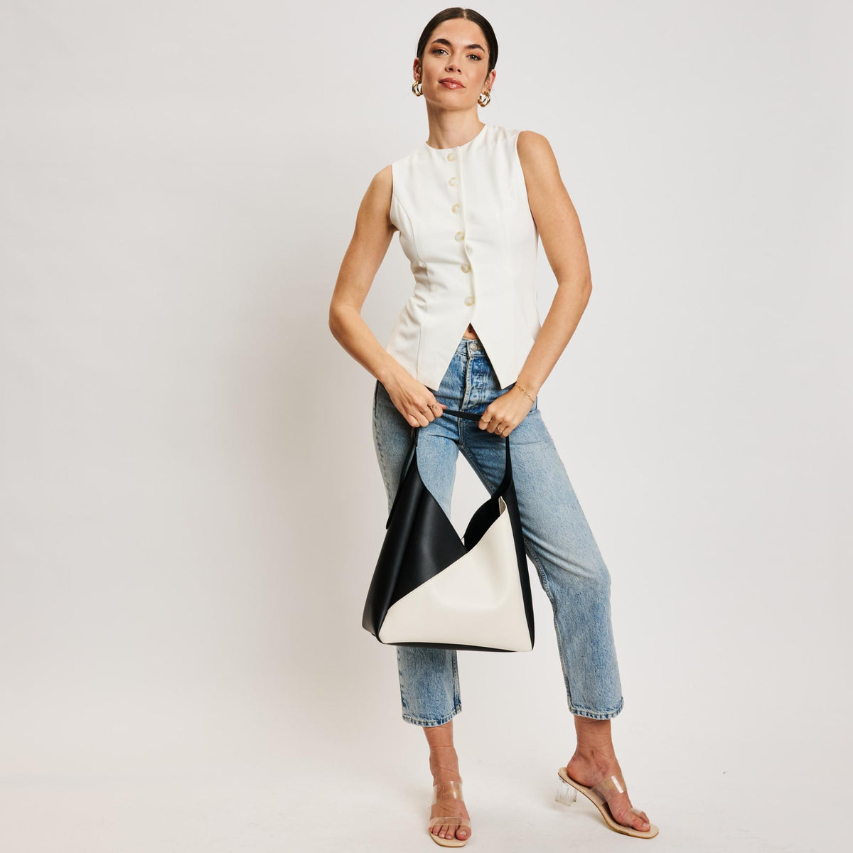 Woman wearing Ivory Black Sol and Selene Frankie Hobo 842017138518 View 3 | Ivory Black