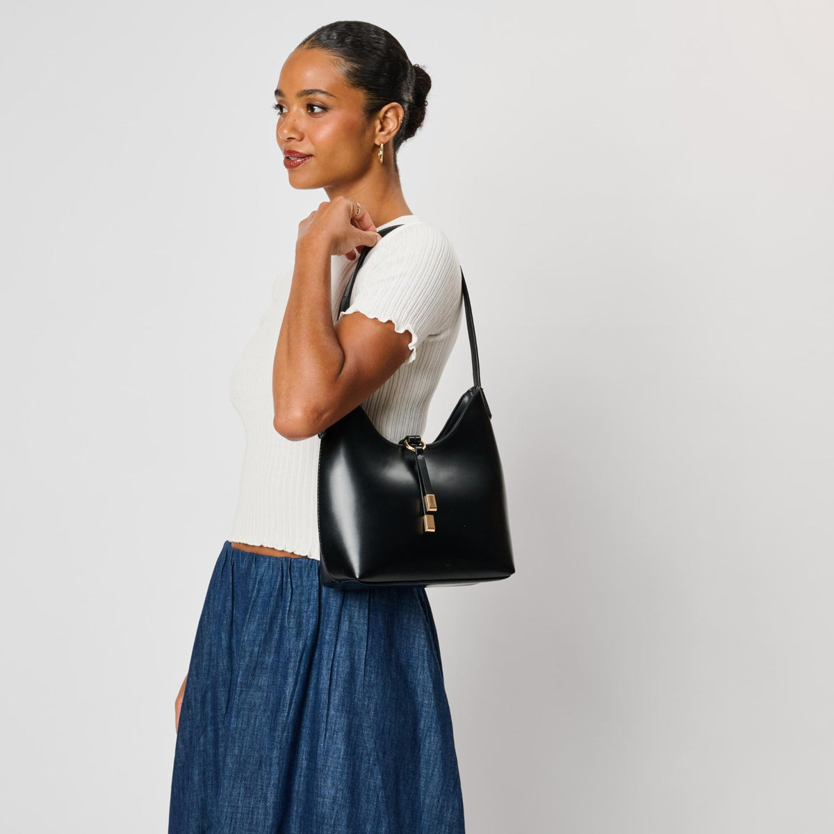 Woman wearing Black Moda Luxe Blair Shoulder Bag 842017143215 View 1 | Black