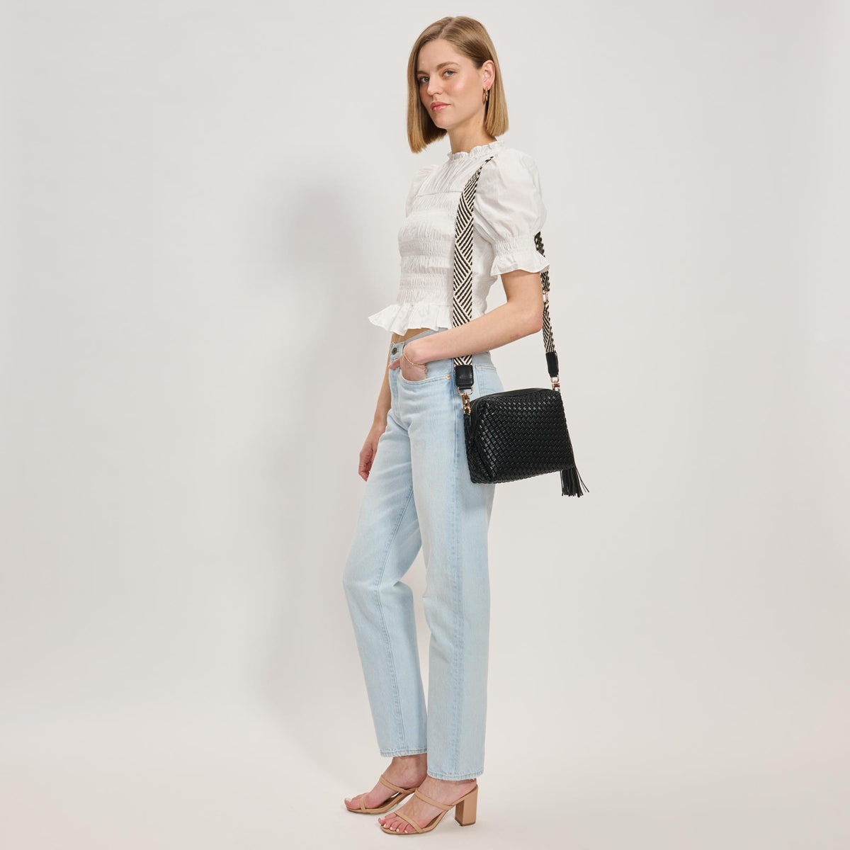 Woman wearing Black Moda Luxe Roxana Crossbody 842017137450 View 3 | Black