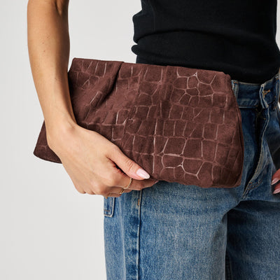 Woman wearing Chocolate Moda Luxe Elva - Croc Embossed Faux Suede Clutch 842017142270 View 1 | Chocolate