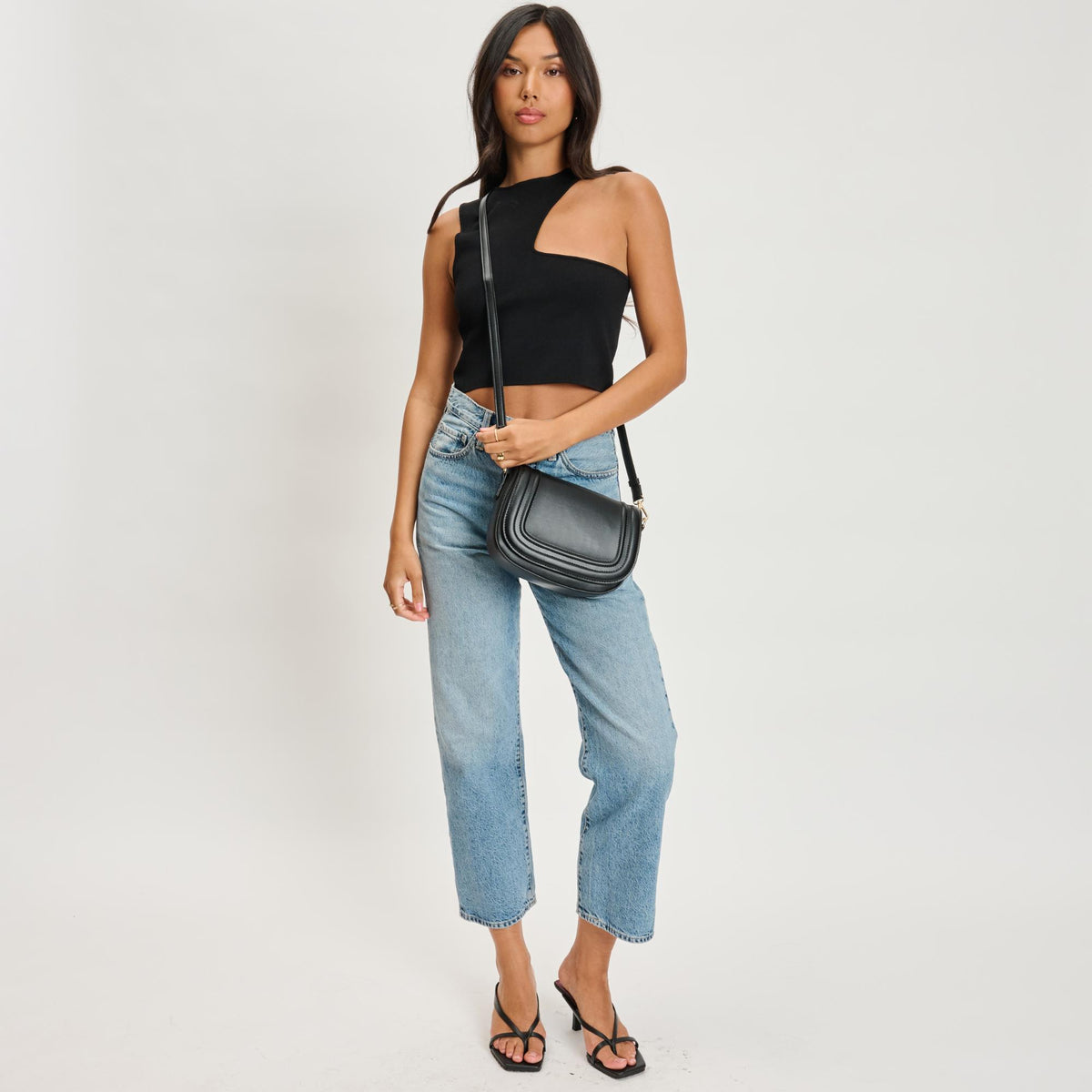 Woman wearing Black Moda Luxe Poshette Crossbody 842017134732 View 3 | Black