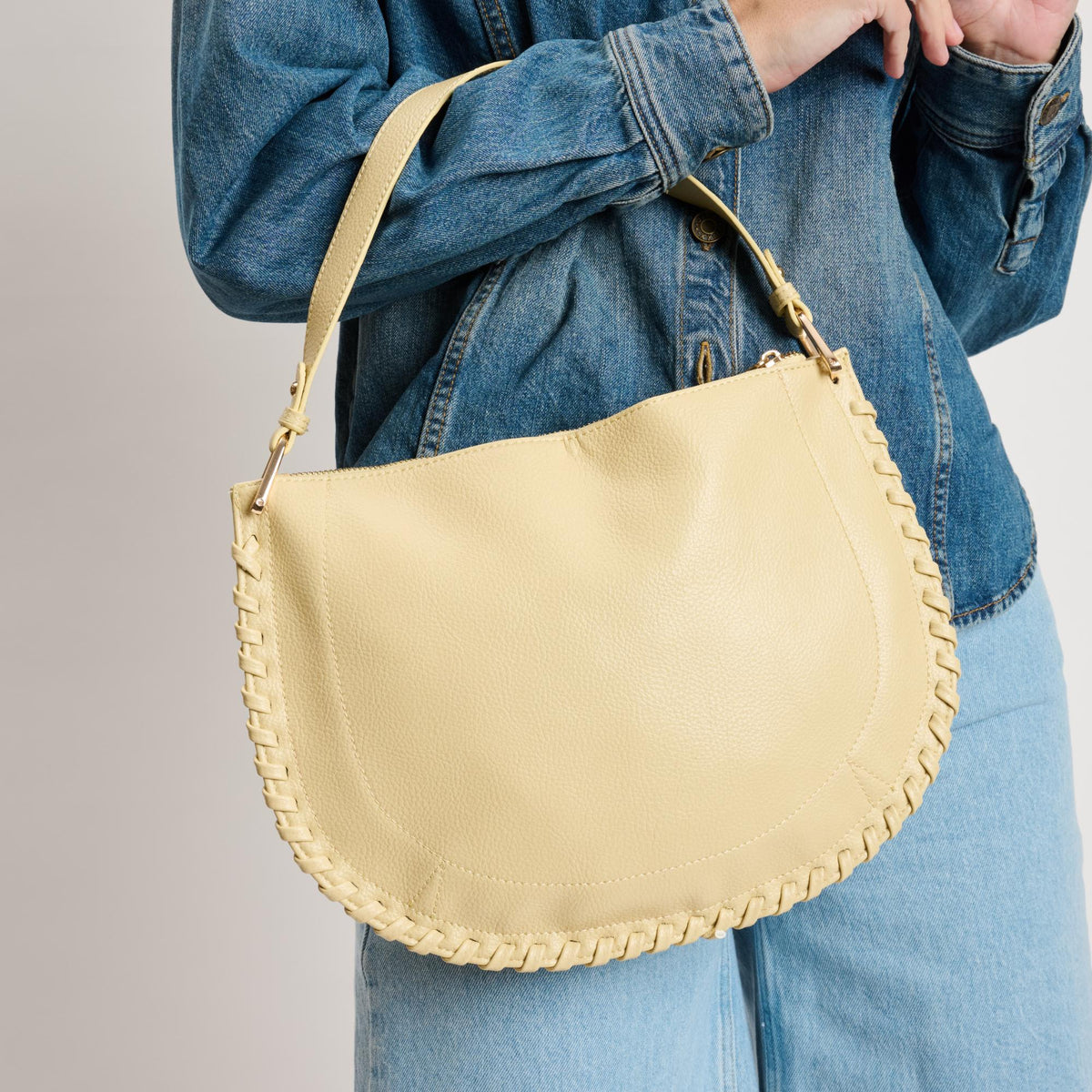 Woman wearing Butter Moda Luxe Lita Hobo 842017141099 View 1 | Butter