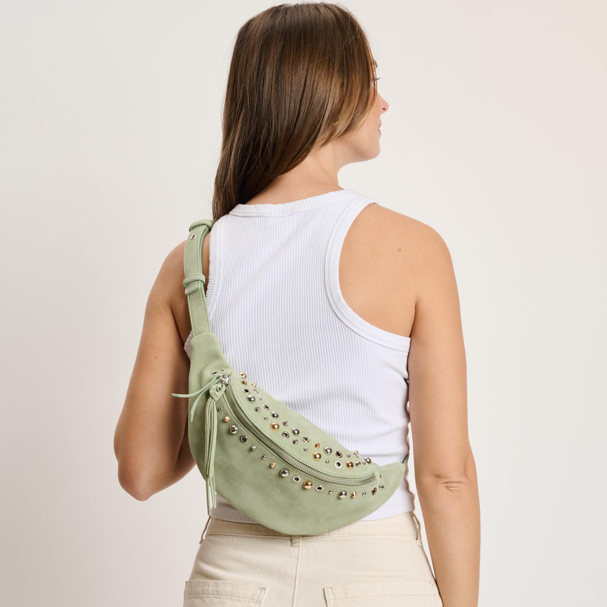 Woman wearing Sage Moda Luxe Star Belt Bag 842017140610 View 3 | Sage