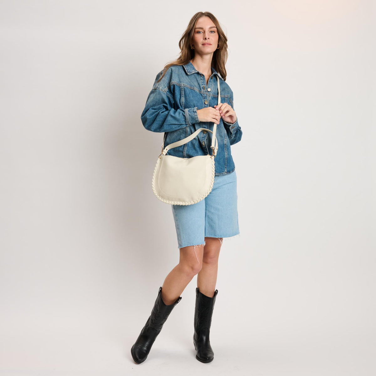 Woman wearing Ivory Moda Luxe Lita Hobo 842017141075 View 2 | Ivory