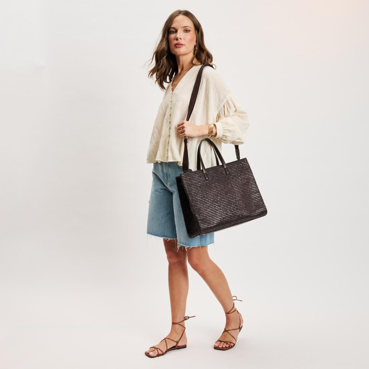Woman wearing Chocolate Moda Luxe Camila Tote 842017140290 View 3 | Chocolate
