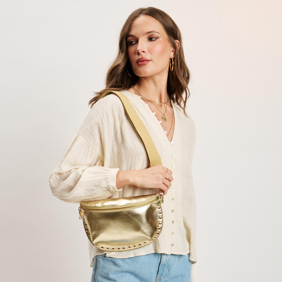 Woman wearing Gold Moda Luxe Gizelle - Metallic Belt Bag 842017141495 View 1 | Gold